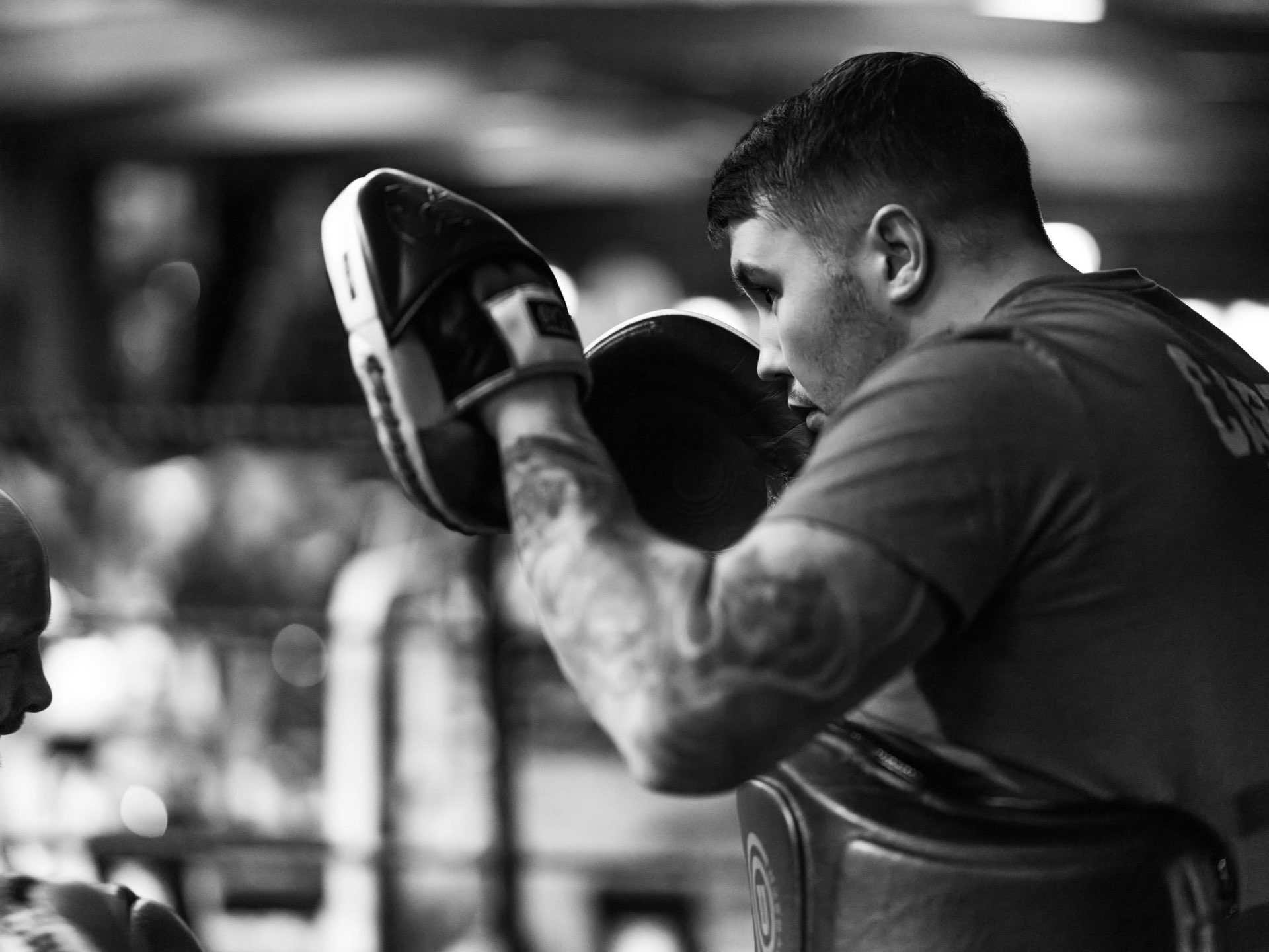 Brandon Carter working the pads in the ring
